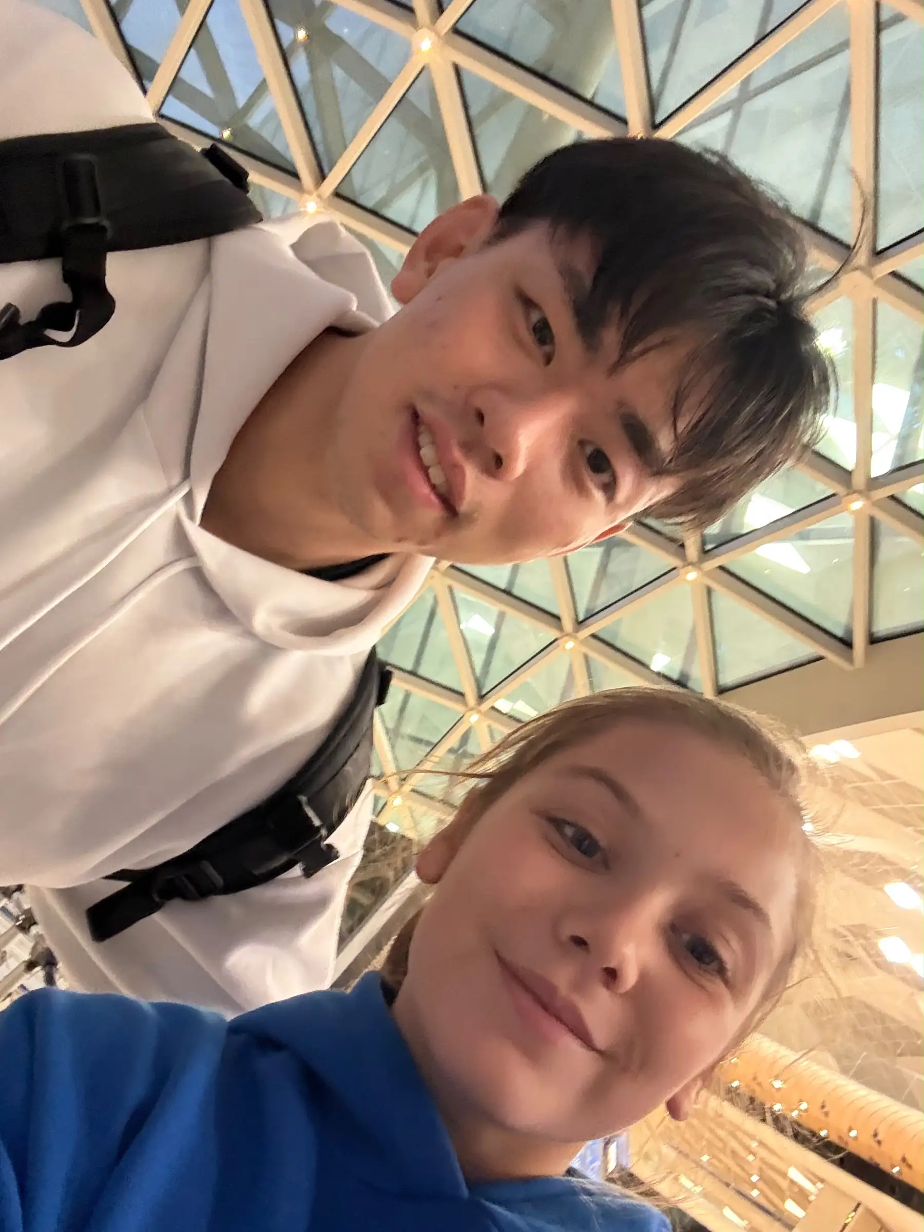 Melissa and a young man in a close-up selfie